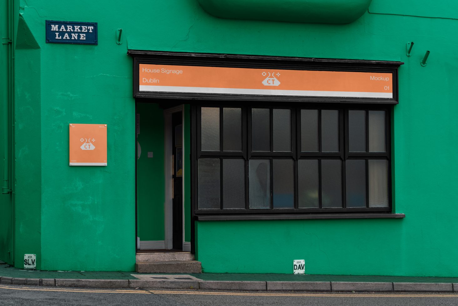 Green storefront mockup with signage, clear window reflection, vibrant wall for design presentation and urban setting template.